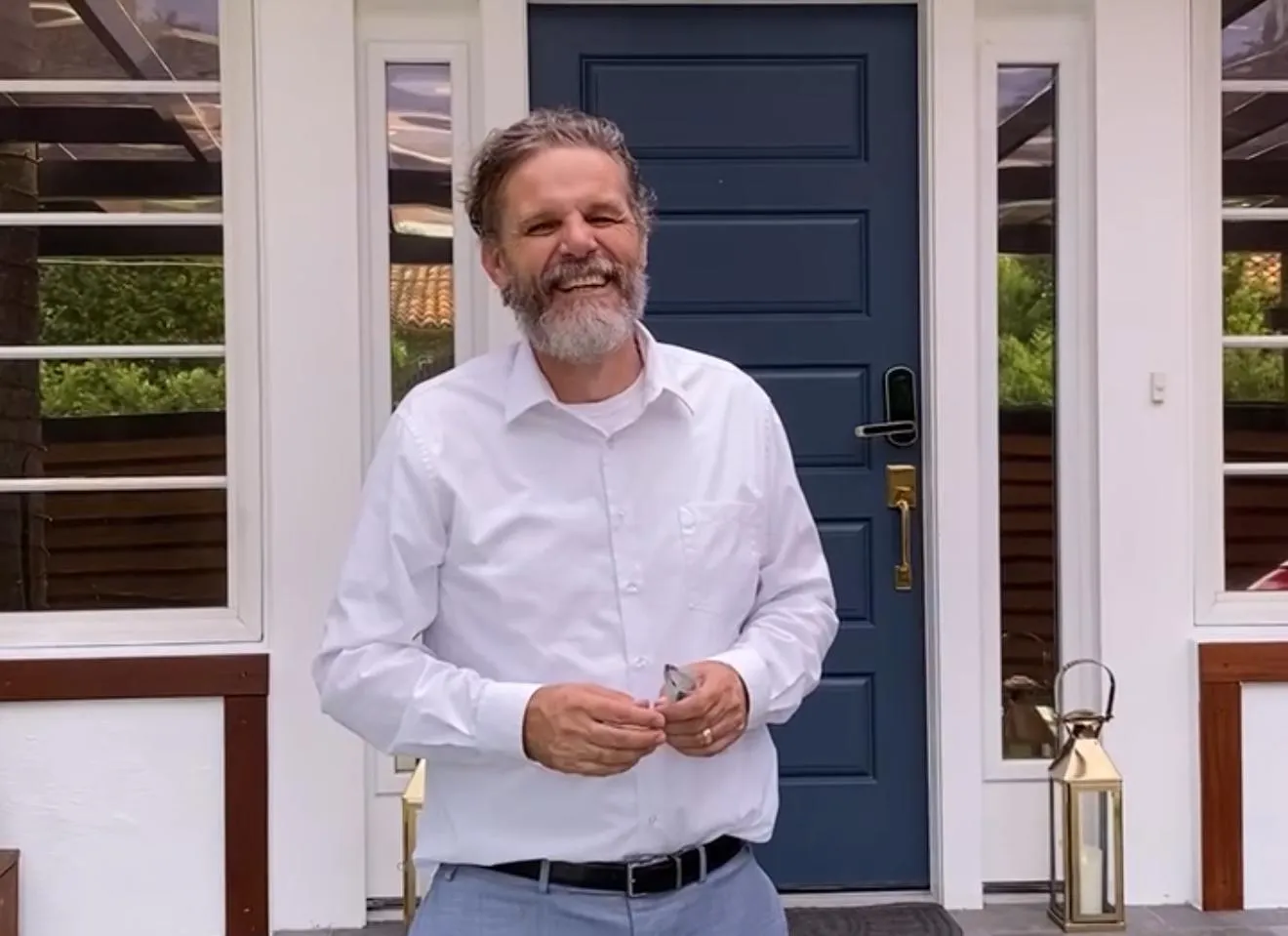 Miami Shores Realtor meeting with home sellers at their dining table